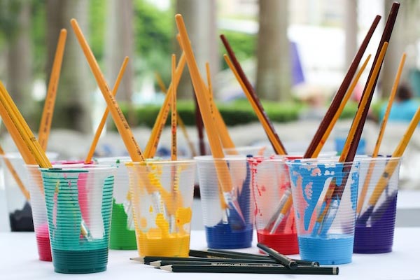 Paintbrushes in cups